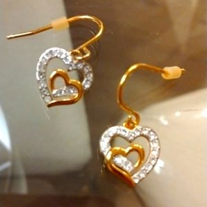 Two golden hearts connected earrings.